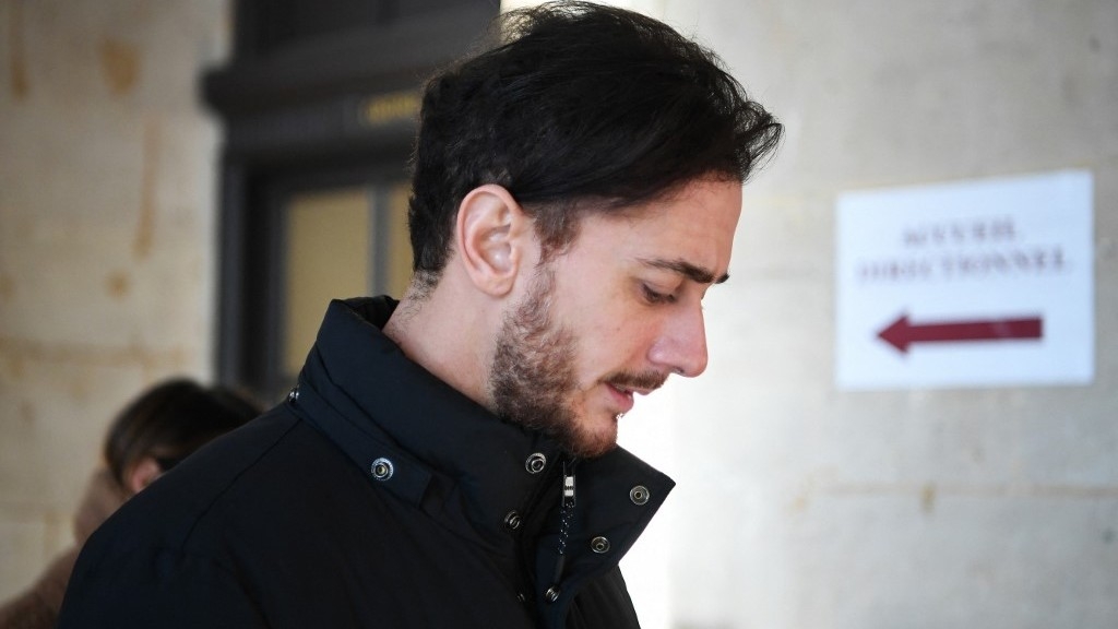 Moroccan singer Saad Lamjarred arrives to appear in court for the opening of his trial, accused of allegedly raping a 20 year old woman in 2016, at the Assizes Court of Paris, on 21 February 2023 (AFP)