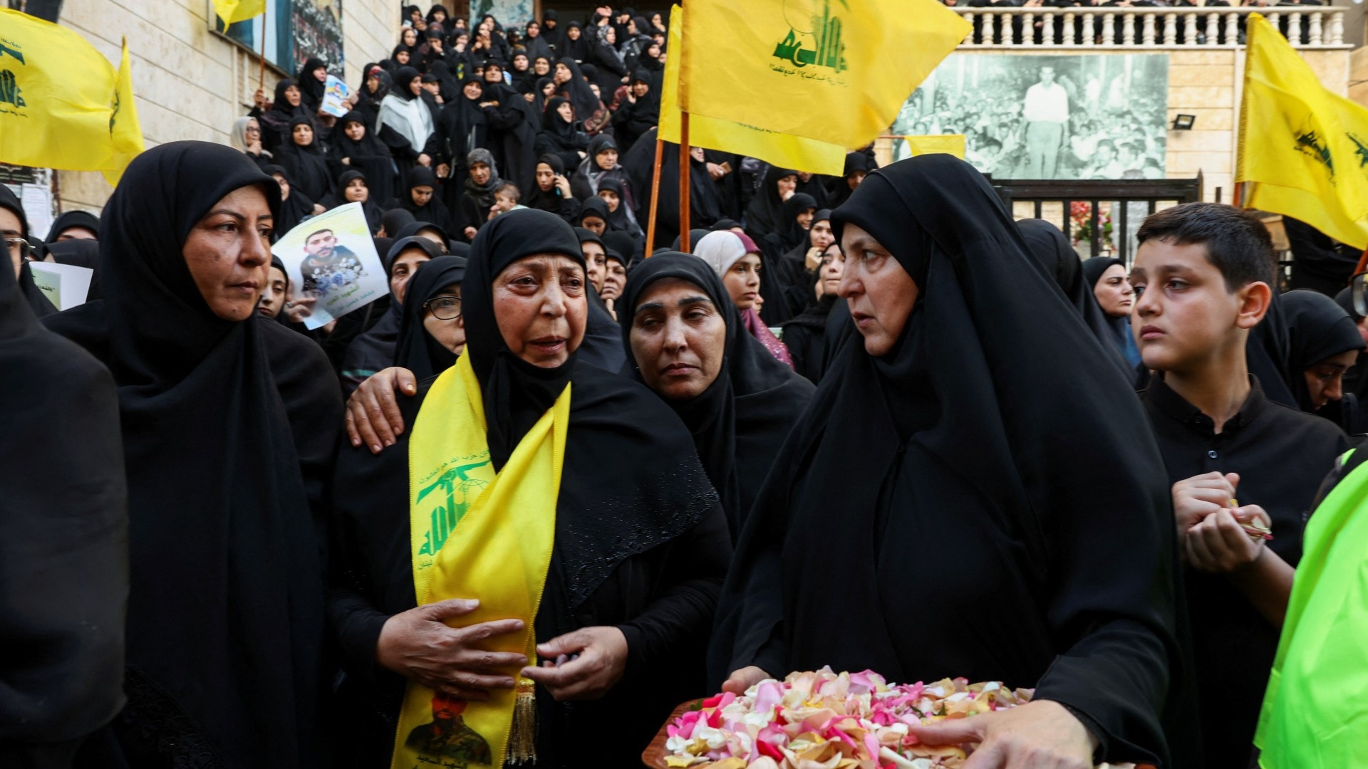 Mourners at the funeral of people who were killed by the detonation of pagers across Lebanon, in Beirut, 18 September (Reuters/Mohamed Azakir)