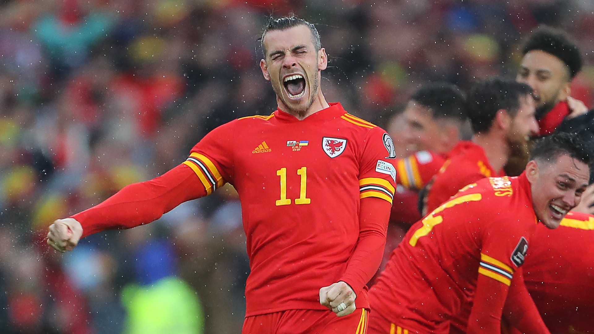 Wales' striker Gareth Bale celebrates after winning the FIFA World Cup 2022 play-off final against Ukraine at the Cardiff City Stadium on 5 June 2022 (AFP)