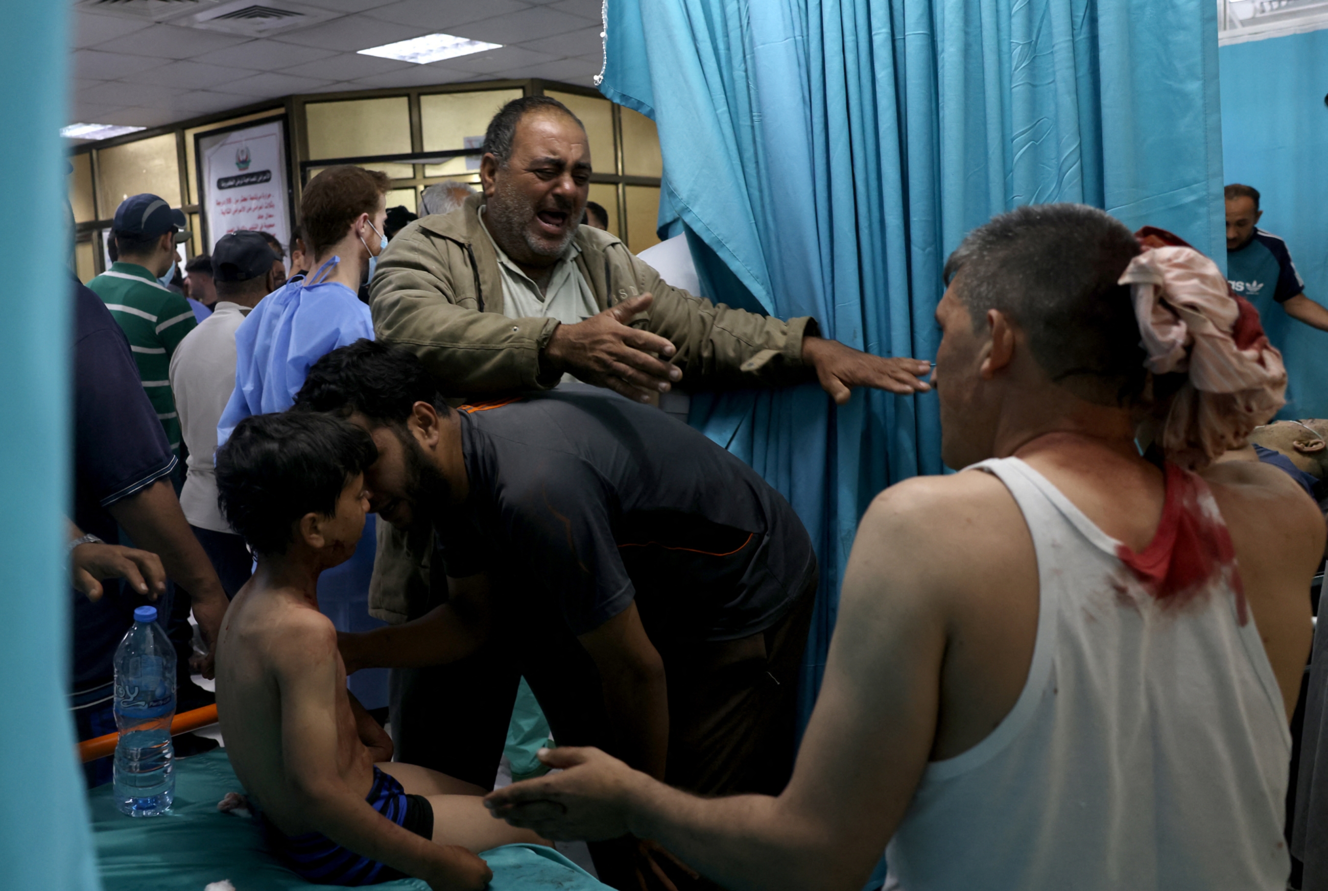 Wounded Palestinians being treated at a hospital in the northern Gaza Strip following Israeli air strikes