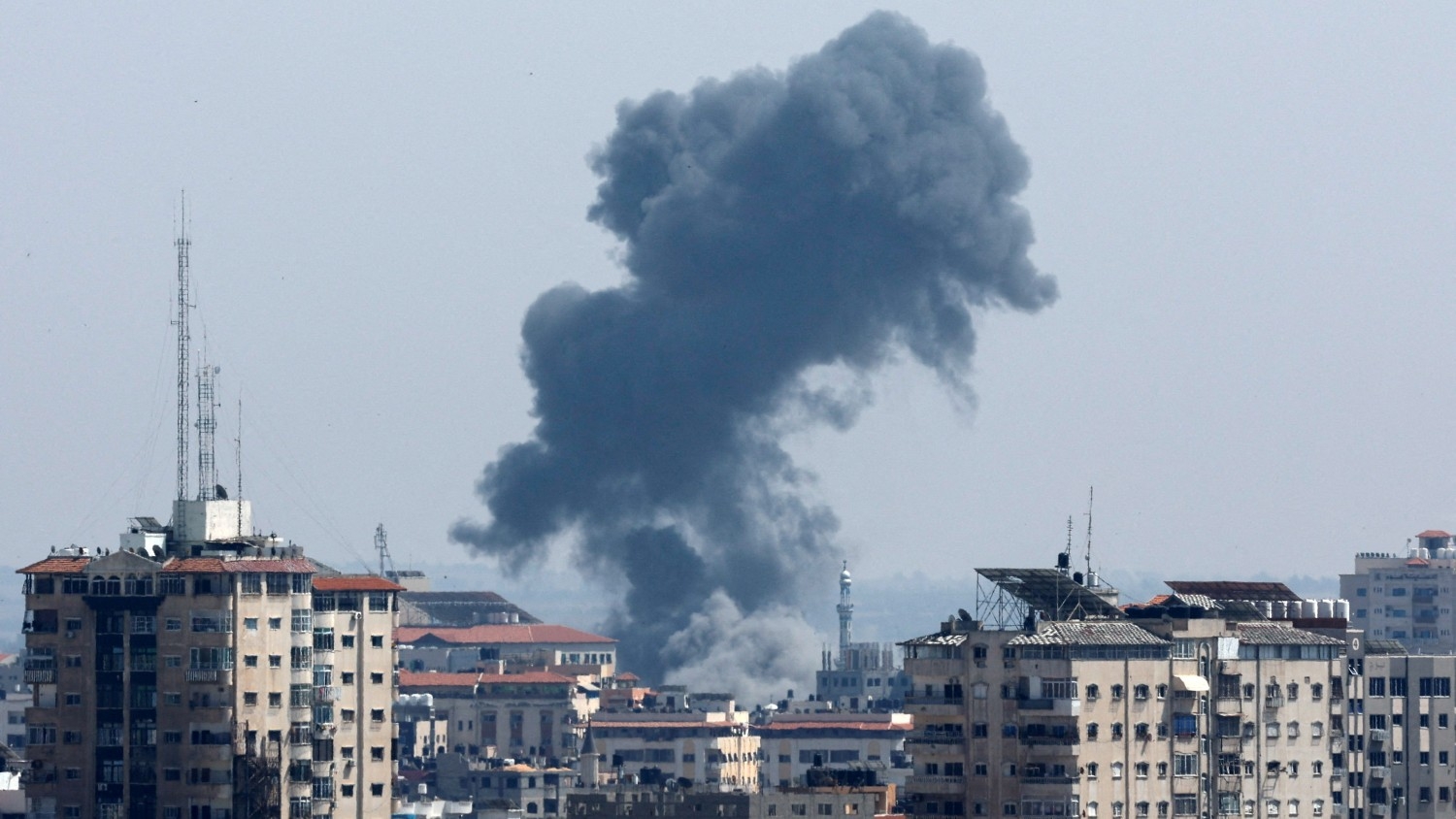 Smoke rises following an Israeli strike, in Gaza on 11 May 2023.