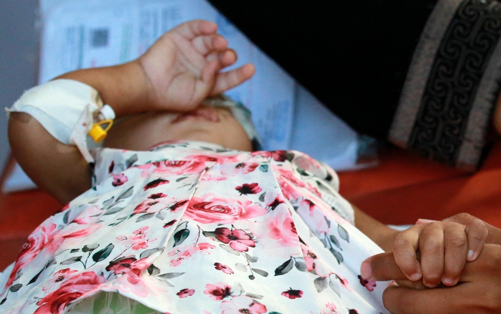 A child with cancer at Al-Nasser Hospital in Khan Younis this month before her evacuation from Gaza to Jordan for treatment (Bashar Taleb/AFP)