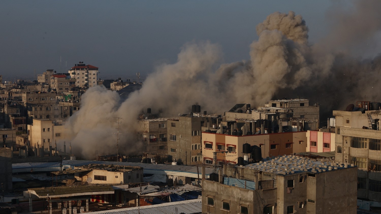 Smoke billows in Rafah following an Israeli air raid on the southern Gaza city on 1 December 2023.