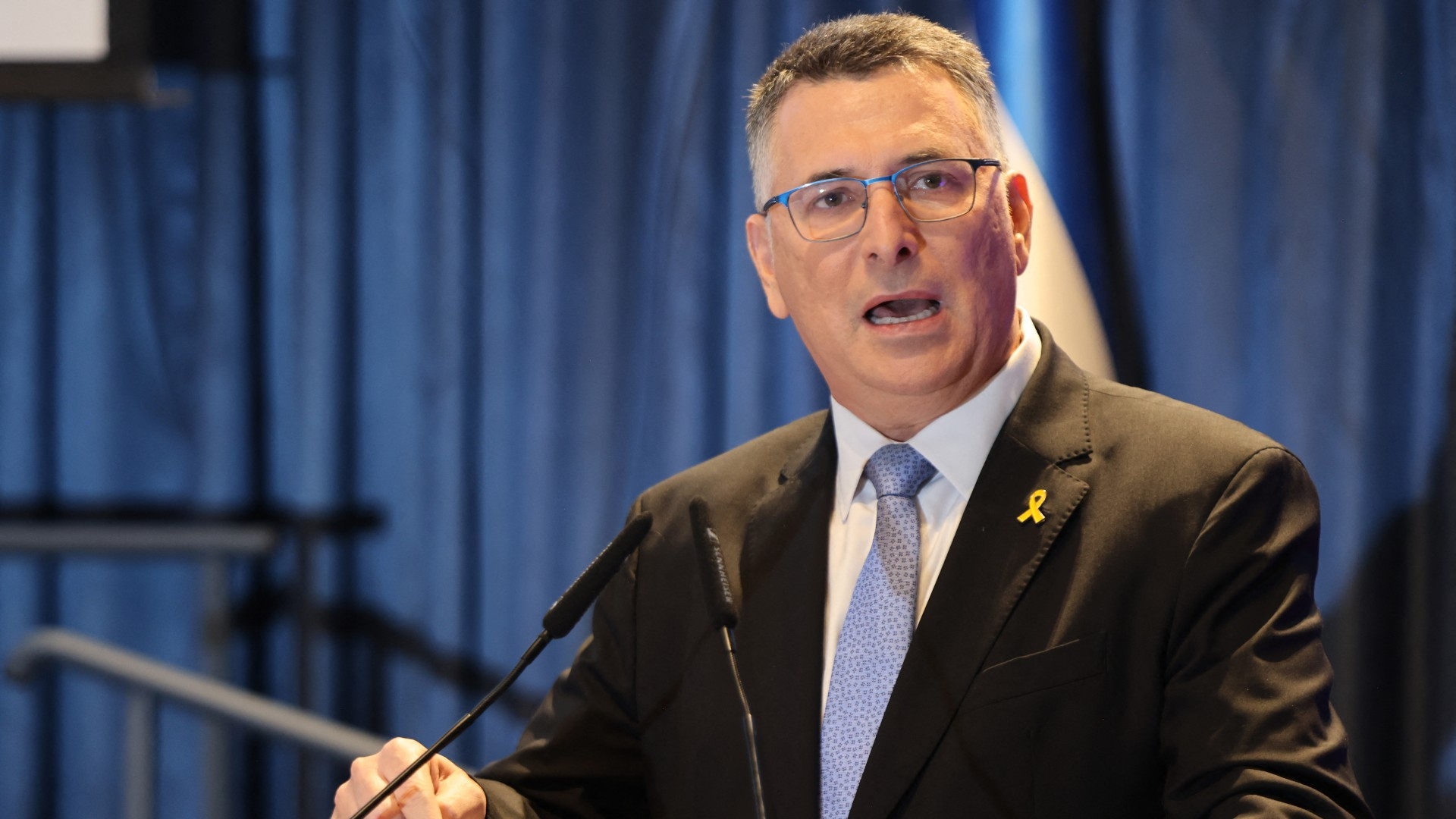 Gideon Saar speaks during a handover ceremony with his predecessor at the Ministry of Foreign Affairs in Jerusalem on 10 November (Menahem Kahana/AFP)