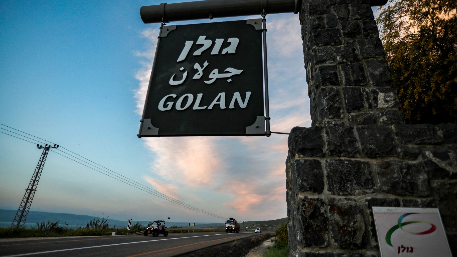 A sign reading Golan in Hebrew, Arabic and English, located at the 1967 Israel-Syria border point, near the sea of Galilee in the Golan Heights (AFP/Jalaa Marey)