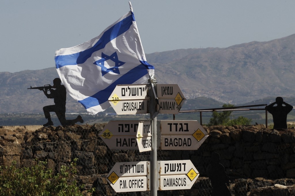 An Israeli flag is seen placed on Mount Bental in the occupied Golan Heights on 10 May 2018.