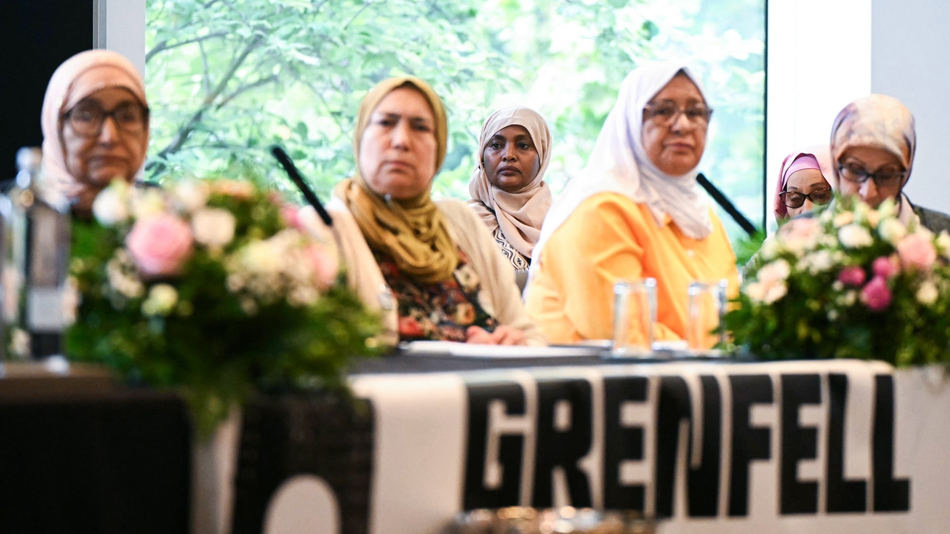 Relatives of the victims of the Grenfell Tower fire disaster attend a press conference at the Royal Lancaster Hotel, in London on 4 September 2024 (AFP/Justin Tallis)