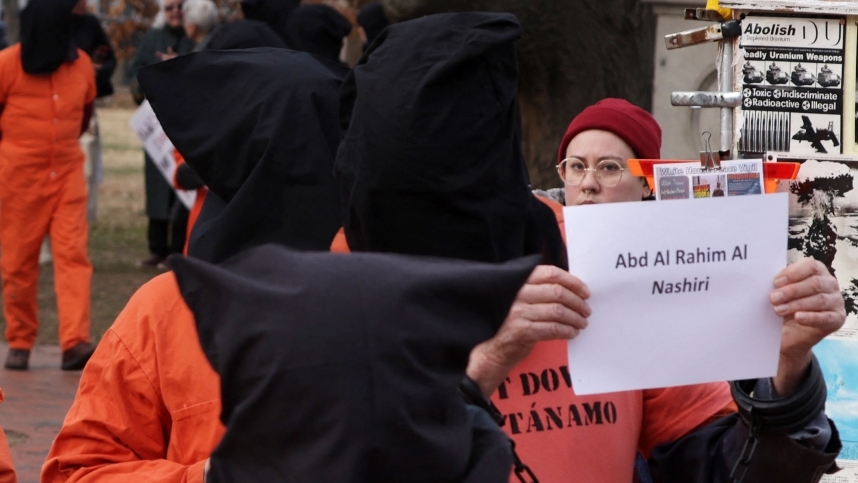 Activists calling for the closure of the Guantanamo Bay prison participate in a protest in front of the White House on 11 January 2023 at Lafayette Square in Washington.