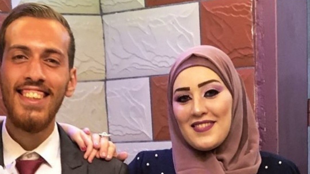 Hadeel with her brother, the writer Karim Abu Al-Roos (Social media)
