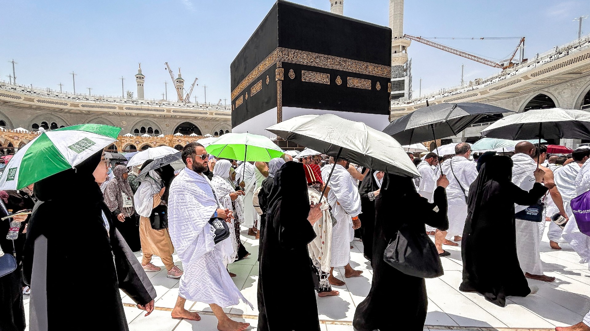 Muslim worshippers walk around the Kaaba at the Grand Mosque in Saudi Arabia's holy city of Mecca on 13 June 2024 (AFP/Fadel Senna)