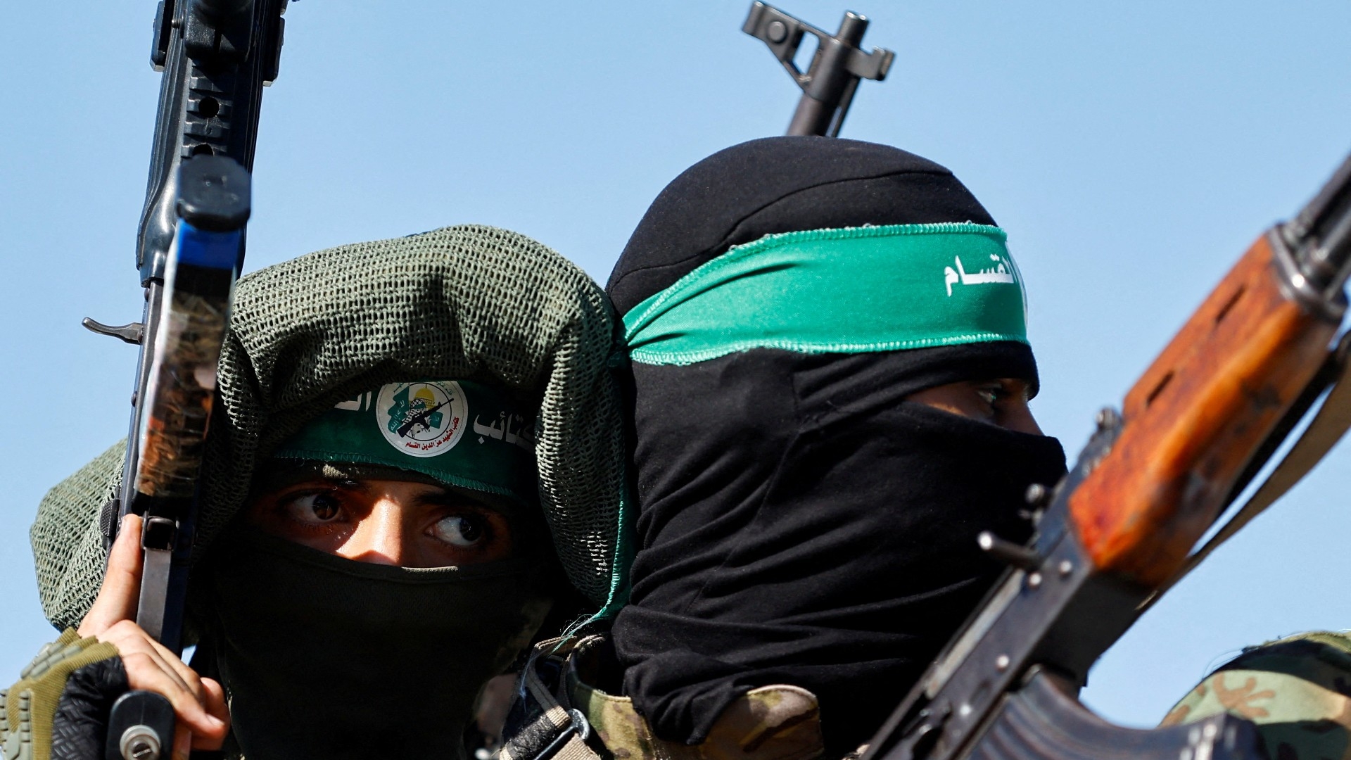 Palestinian fighters from Hamas take part in a military parade to mark the anniversary of the 2014 war with Israel, in the central Gaza Strip, 19 July, 2023 (Reuters/Ibraheem Abu Mustafa)