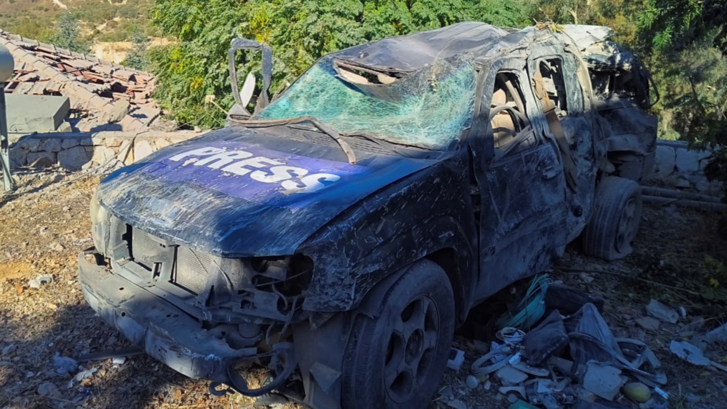 Damaged car with the term 'press' written on it following a deadly Israeli strike on Hasbaya, southern Lebanon on 25 October 2024 (Stringer/Reuters)