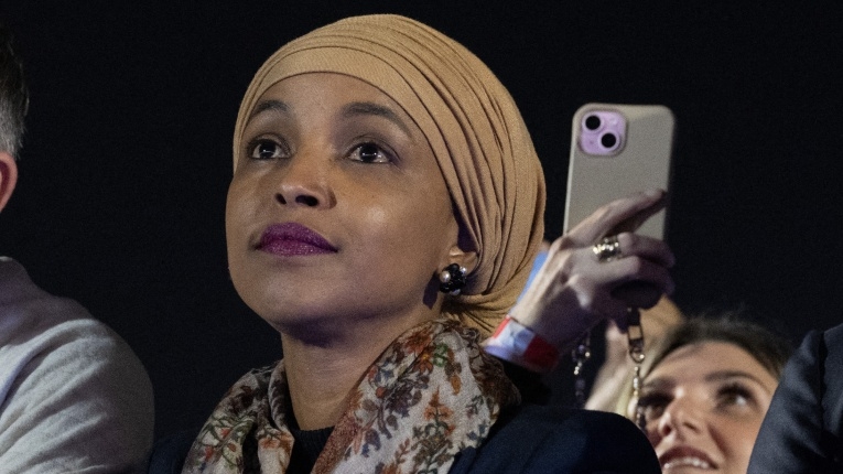 US Representative Ilhan Omar listens as US Vice President and Democratic presidential candidate Kamala Harris speaks on The Ellipse just south of the White House in Washington DC on 29 October 2024.