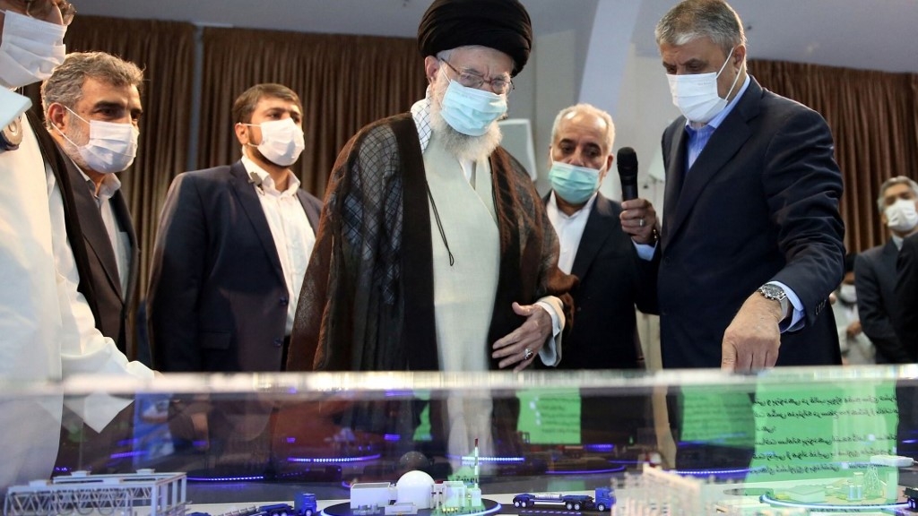 Iran's Supreme Leader Ayatollah Ali Khamenei (2nd R) visiting an exhibition of the country's nuclear industry achievements in Tehran, on 11 June 11, 2023, accompanied by the head of the Atomic Energy Organisation Mohammad Eslami (R). (AFP)