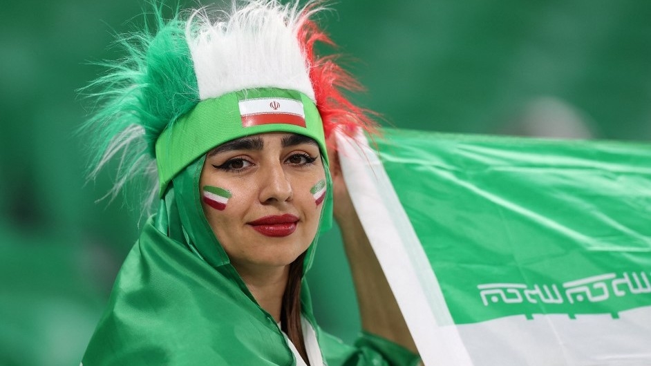 A fan of the Iranian team prior to the Qatar 2022 World Cup Group B football match between Iran and USA at the Al-Thumama Stadium, Doha, on 29 November 2022 (AFP)