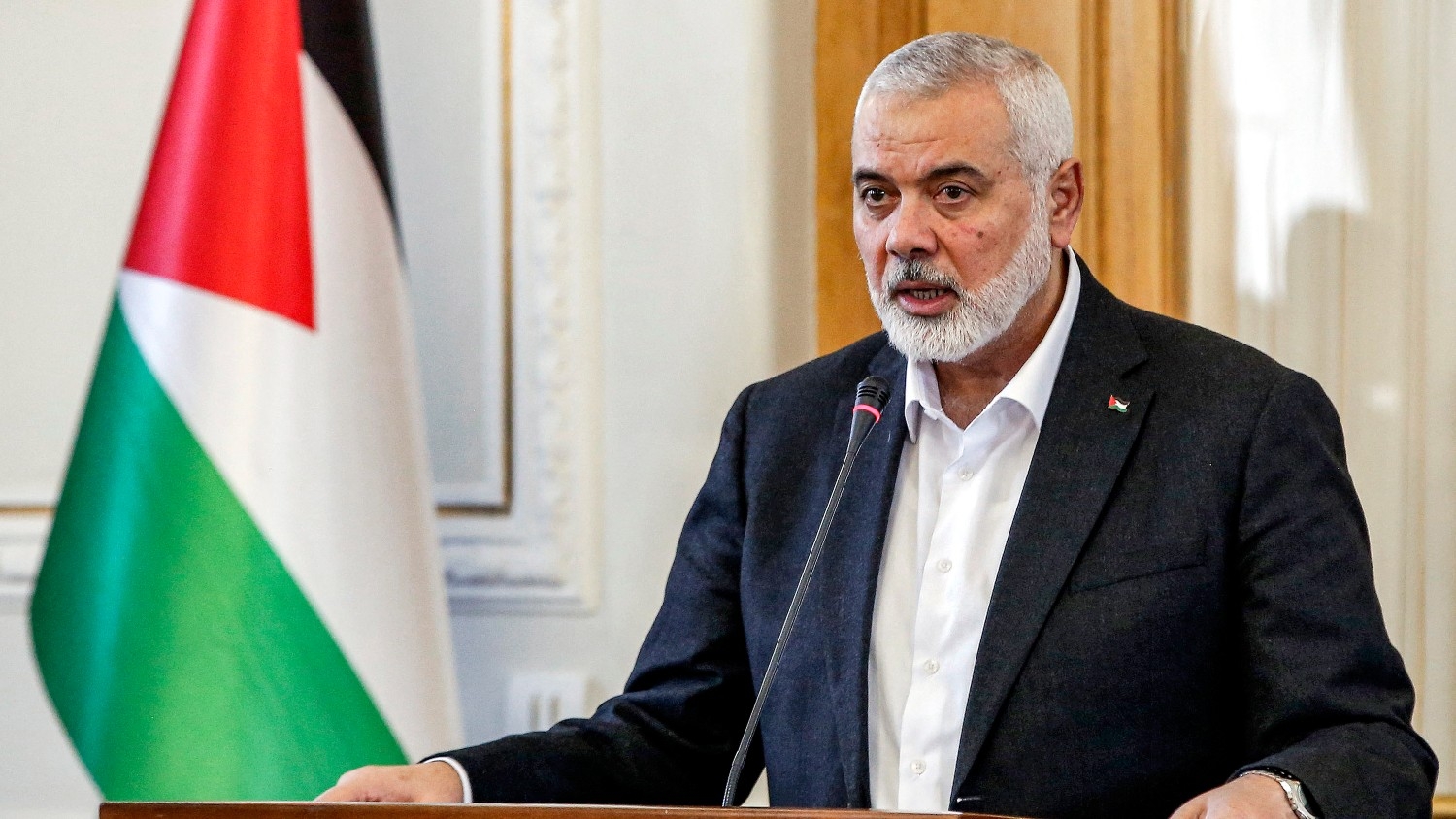 Ismail Haniyeh, the Doha-based political bureau chief of Hamas, speaks to the press after a meeting with the Iranian foreign minister in Tehran on 26 March 2024.