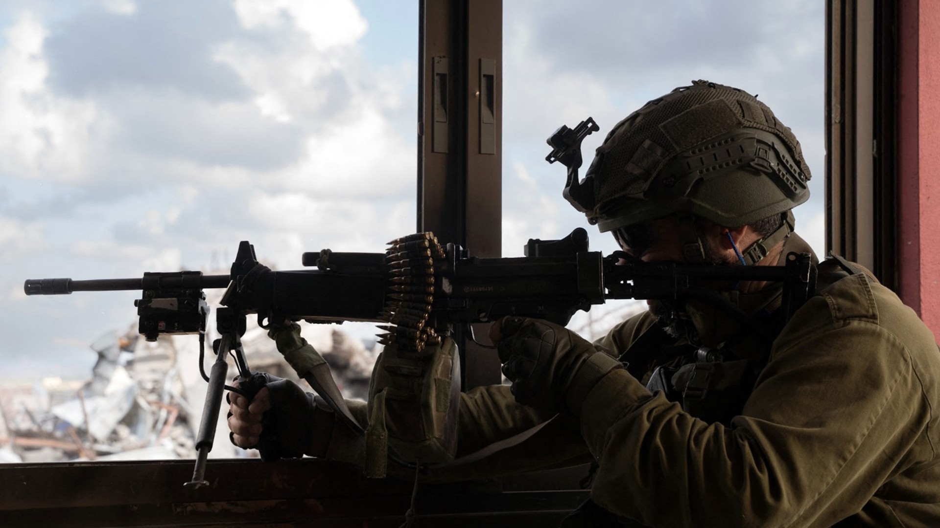 A handout picture released by the Israeli army in May shows an Israeli soldier in Gaza City (AFP)