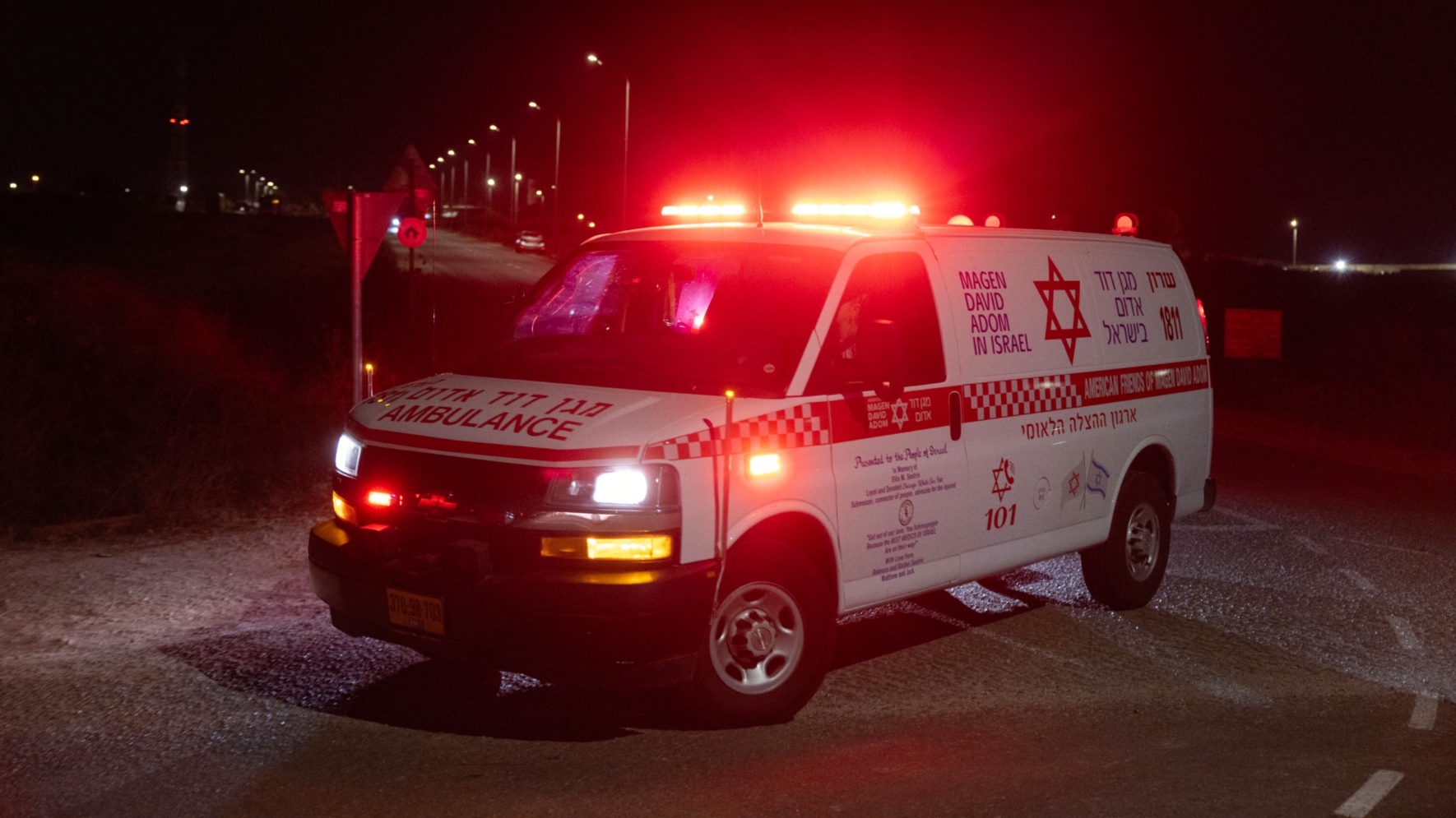 An ambulance leaves the scene of a drone strike near the northern Israeli town of Binyamina on 13 October 2024 (Oren Ziv/AFP)