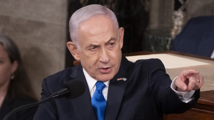 Israeli Prime Minister Benjamin Netanyahu speaks to a joint meeting of Congress at the US Capitol on 24 July 2024 in Washington, DC (Roberto Schmidt/AFP)