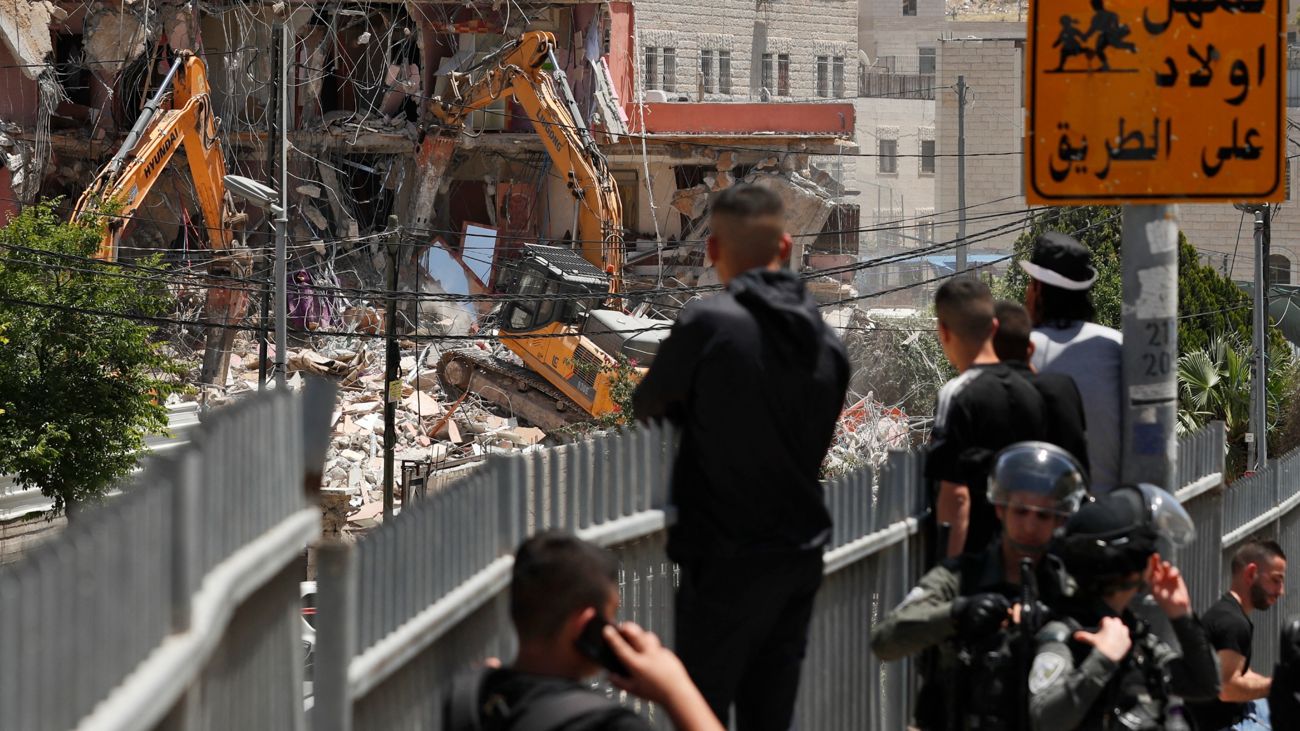 Israeli machinery demolish the home of Palestinian family in the East Jerusalem neighbourhood of Silwan on 10 May 2022. (Afp)