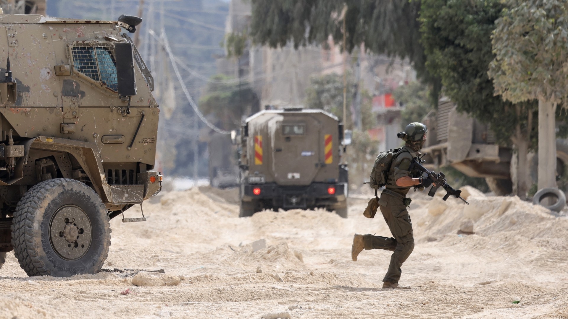 Israeli soldiers conducted a raid on the Nur Shams refugee camp near Tulkarem in the occupied West Bank on 28 August 2024 (AFP/Jaafar Ashtiyeh)