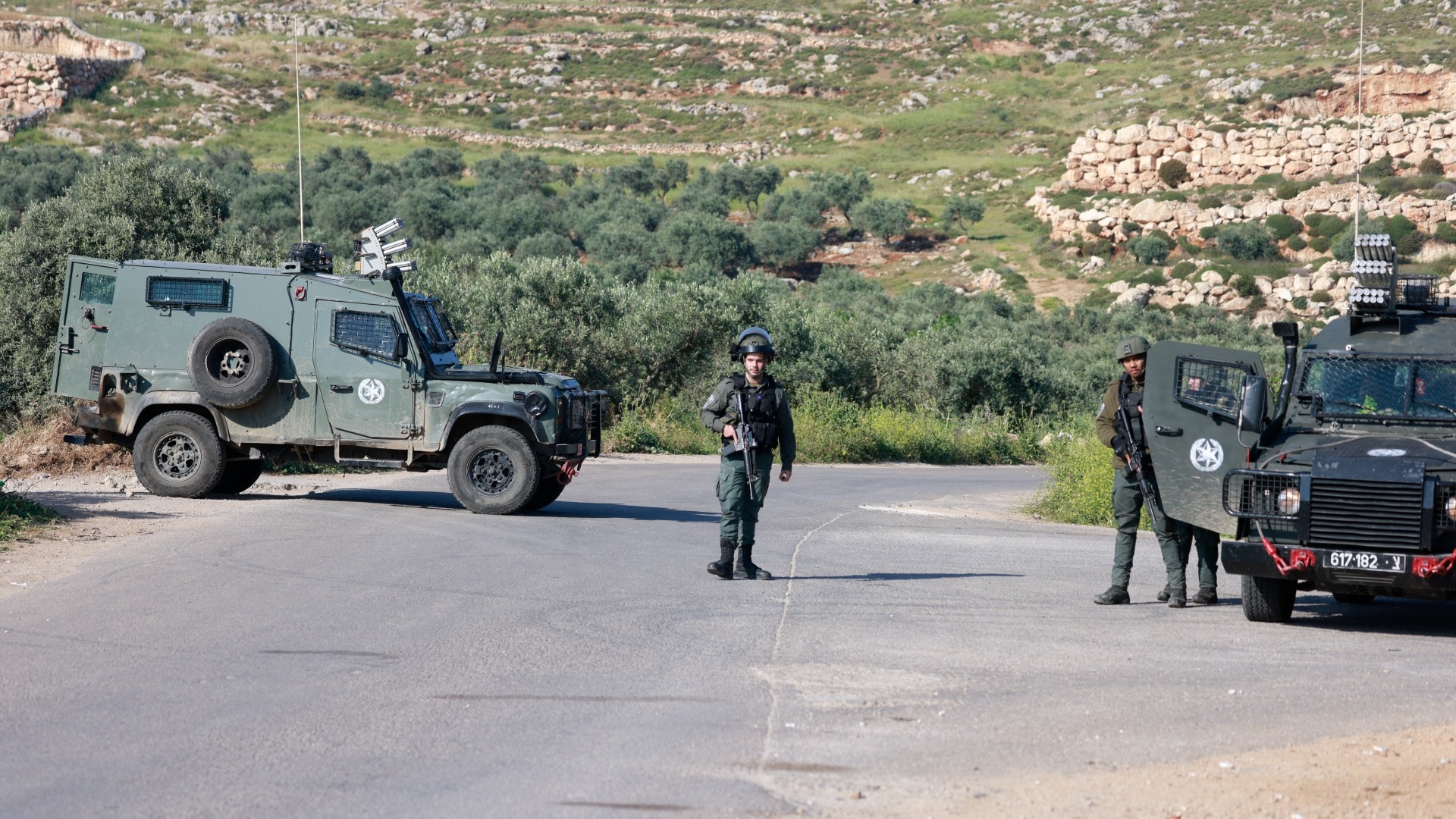 Israeli security forces man a checkpoint in the village of Mughayir near Ramallah in the occupied West Bank on 13 April 2024 (AFP/Jaafar Ashtiyeh)