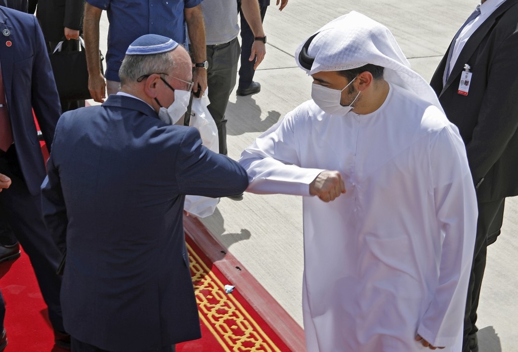 Israeli National Security Advisor Meir Ben-Shabbat elbow bumps with an Emirati official on 1 September.