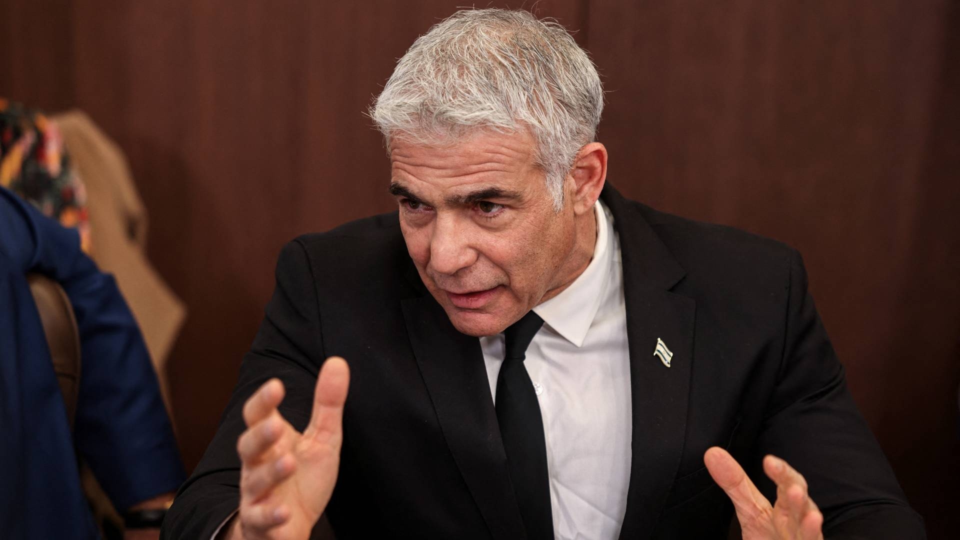 Israeli Foreign Minister Yair Lapid said Israel is in contact with the US on ways of stopping Iran from becoming a nuclear threshold state.