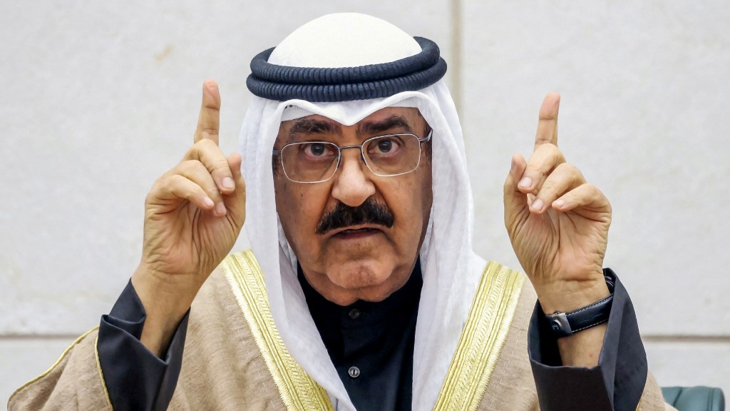 Kuwait’s new emir, Sheikh Mishal al-Ahmed Al Sabah, is sworn in before lawmakers in Kuwait City on 20 December 2023 (Yasser al-Zayyat/AFP)