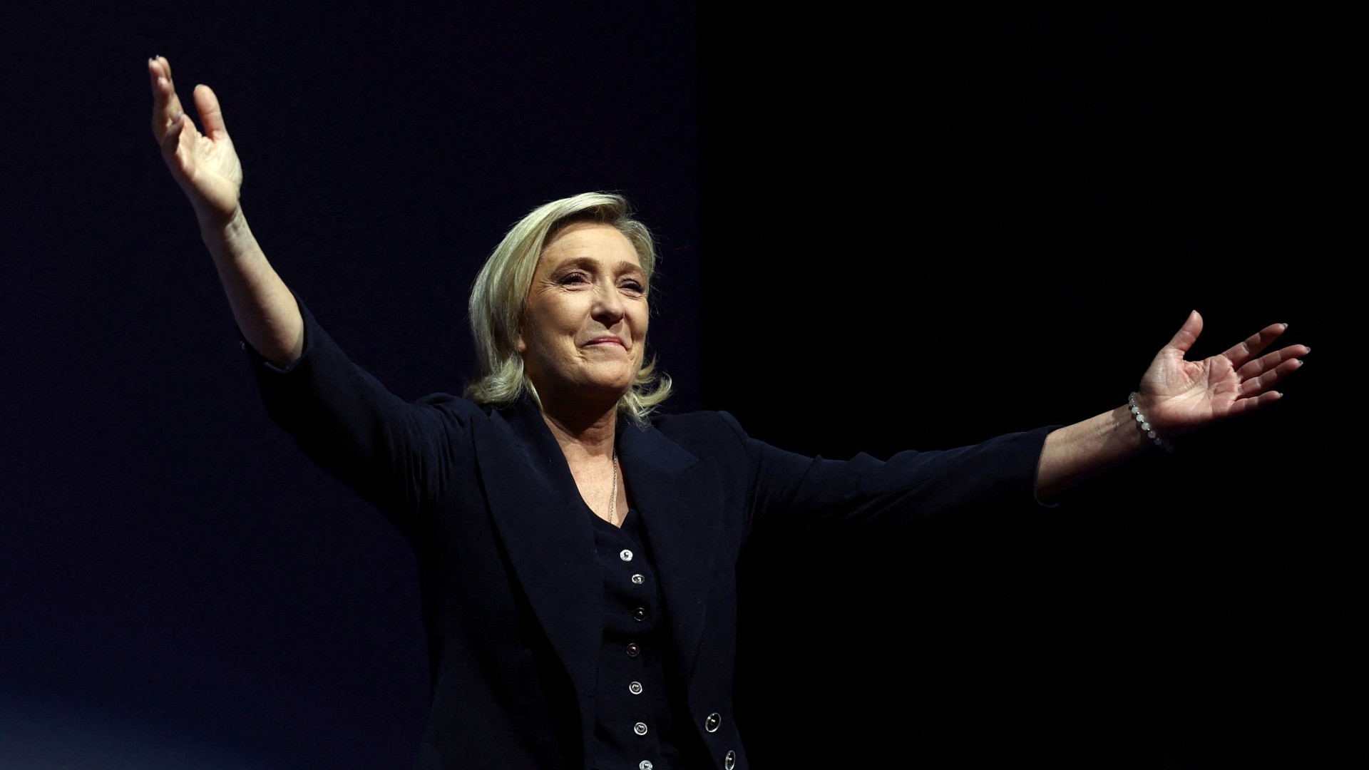 Marine Le Pen, French far-right leader reacts on stage after partial results in the parliamentary elections in Henin-Beaumont, 30 June (Reuters/Yves Herman)
