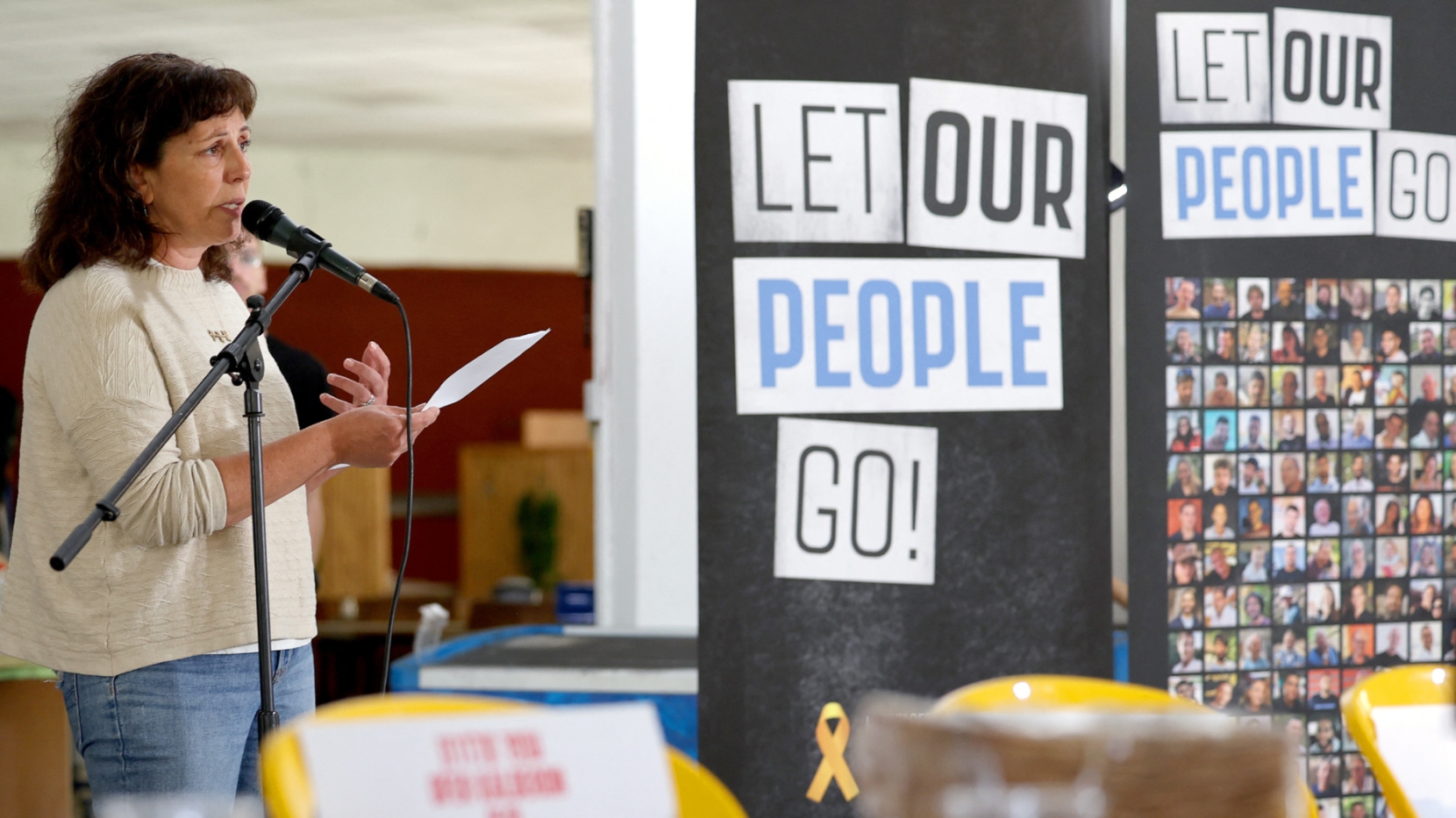 Released Israeli hostage Liat Beinin Atzili speaks at a passover ceremony in Nir Oz to call for the release of the remaining hostages on 11 April 2024 (Jack Guez/AFP)