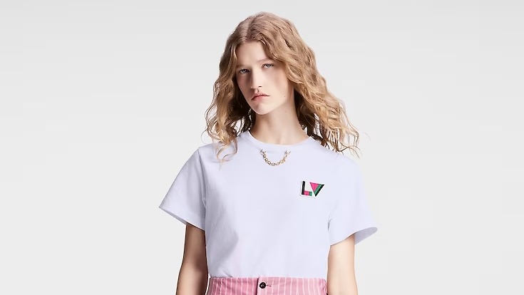 The white t-shirt features the Louis Vuitton initials in pink, green and black, which some social media users have likened to a watermelon (Louis Vuitton)