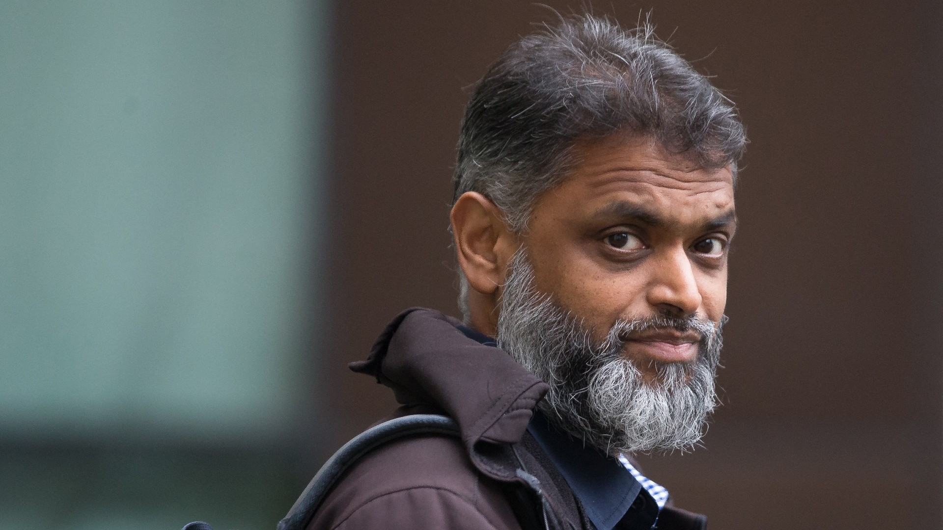 British campaigner Moazzam Begg said that the removal of his passport had denied him the freedom to travel for work and to visit family abroad (AFP/File photo)