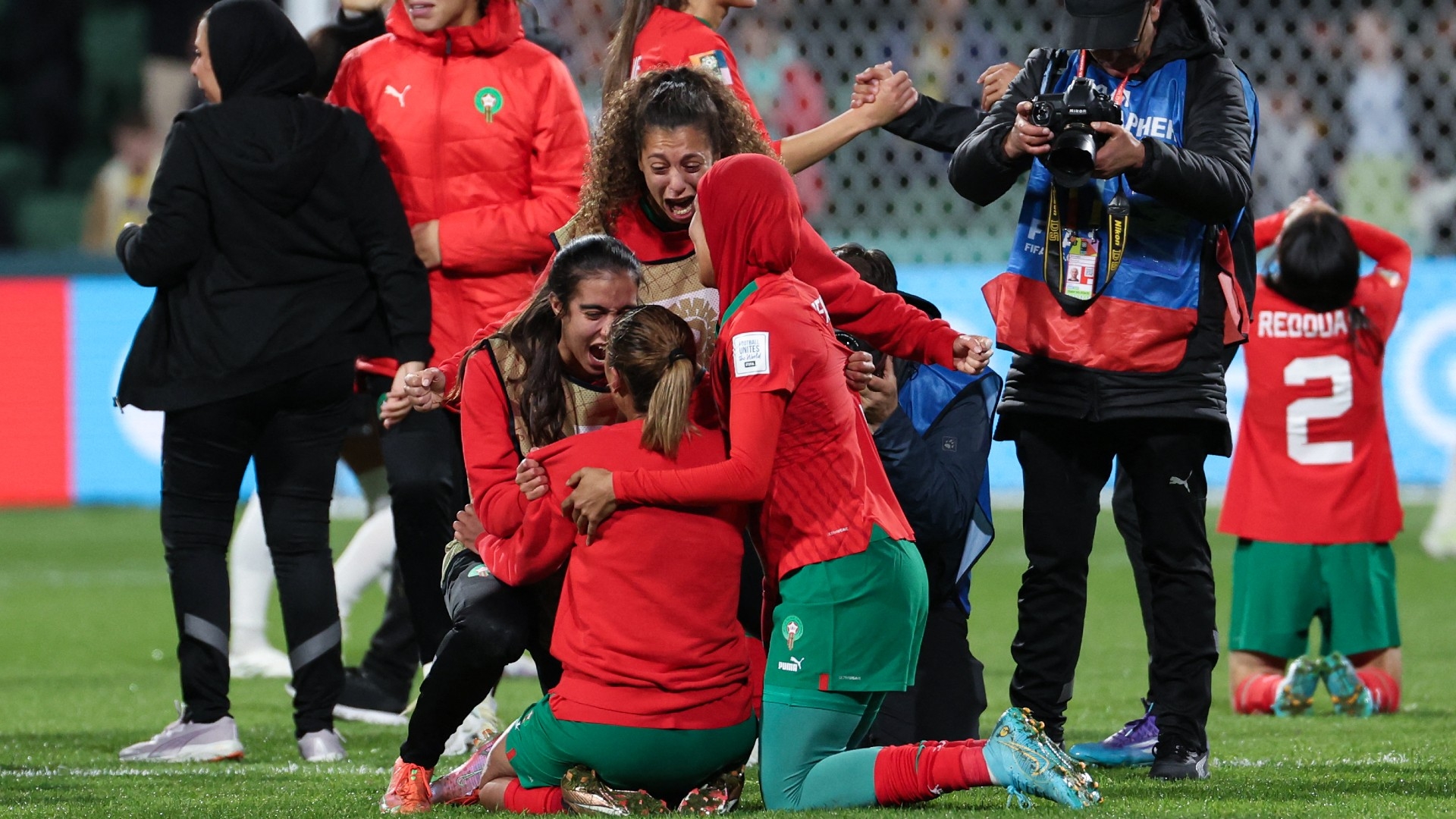 Morocco players celebrate after beating Colombia 1-0 during a 2023 Women's World Cup group match at Perth Rectangular Stadium in Perth, Australia on 3 August 2023 (AFP)
