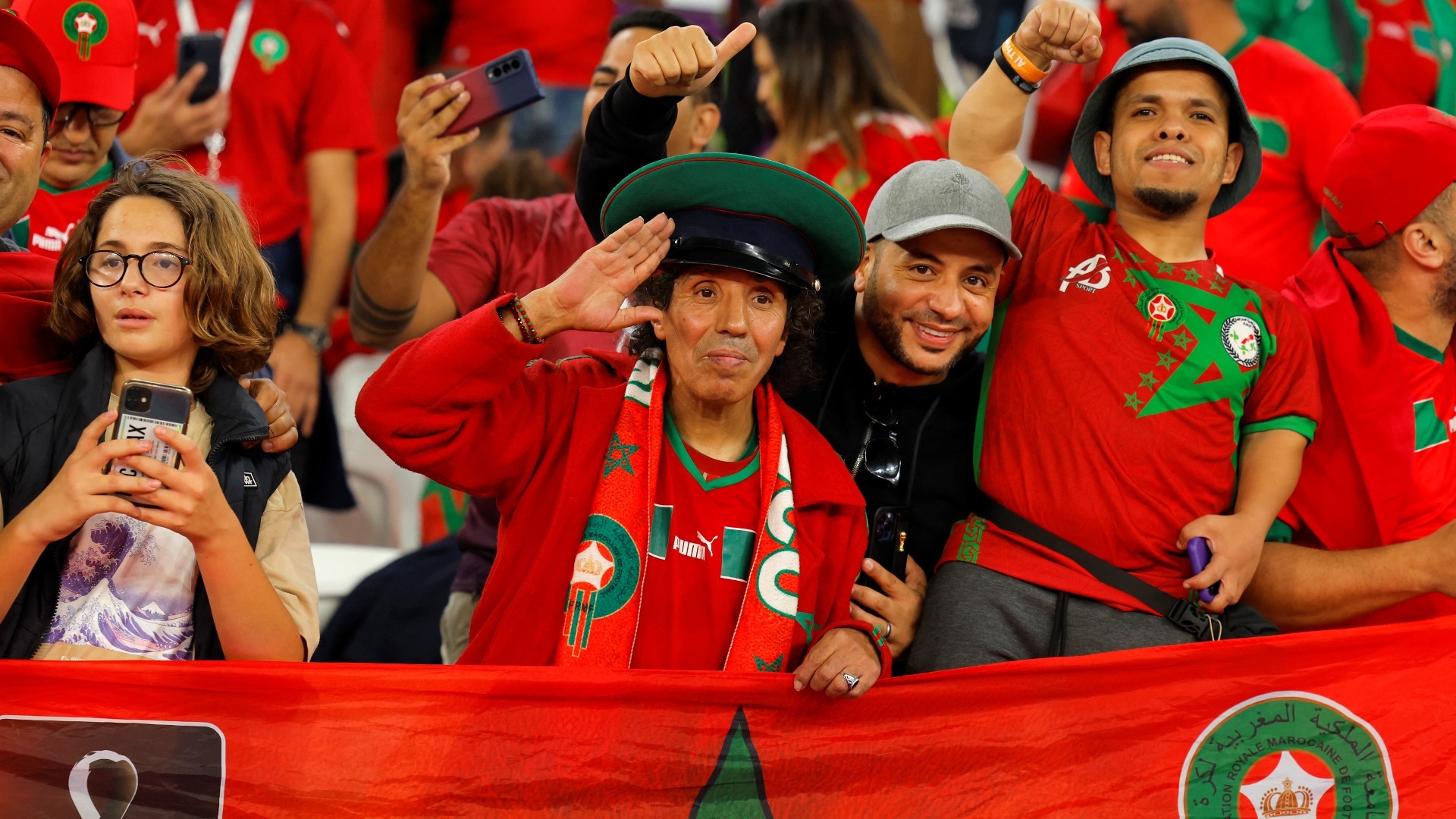 Morocco supporters cheer prior to the Qatar 2022 World Cup quarter-final football match against Portugal at Al-Thumama Stadium in Doha on 10 December 2022 (AFP)