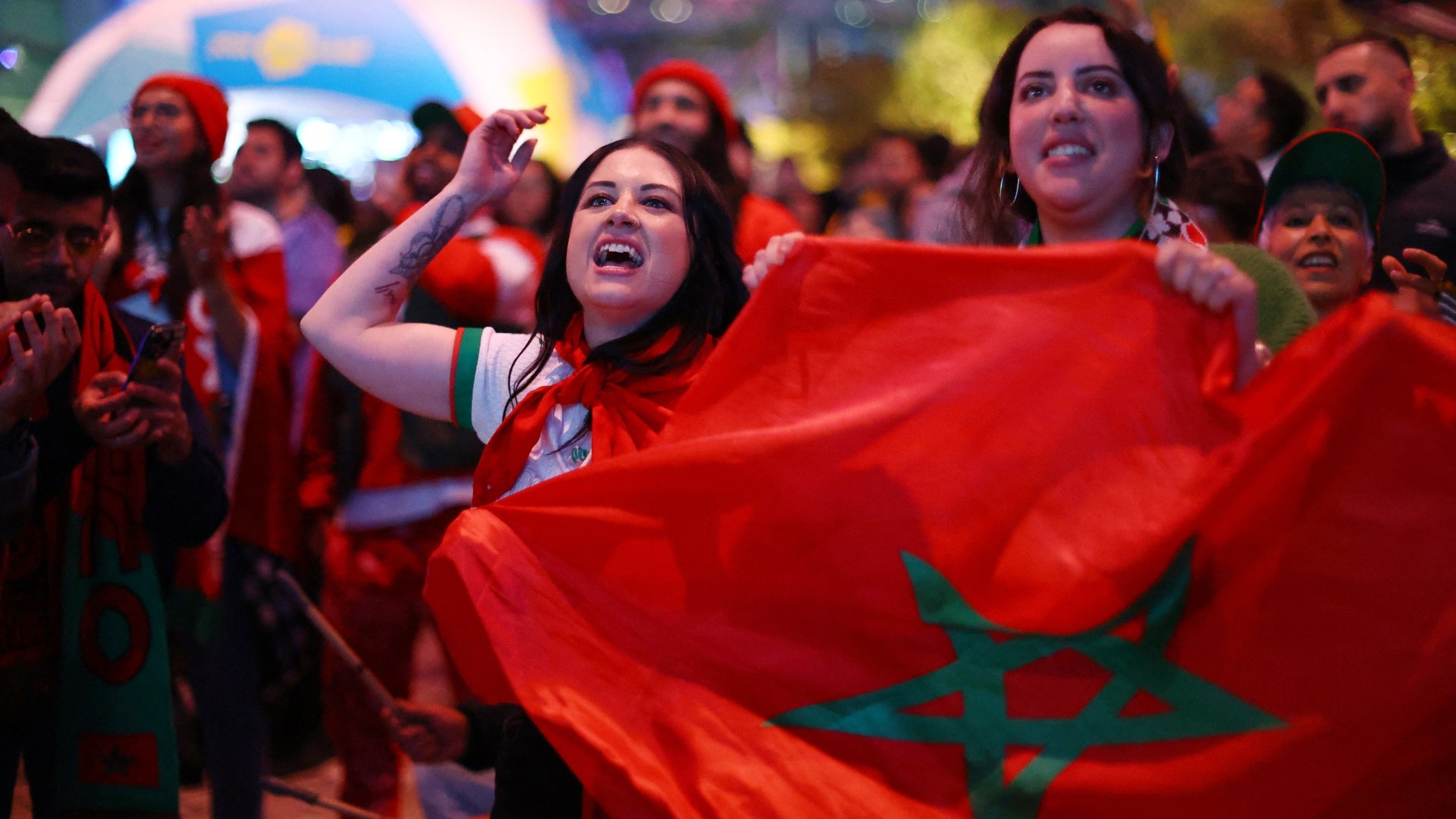  Morocco fans react as they watch the Group H match between Morocco and Colombia at a fan park in Melbourne, Australia on 3 August 2023 (Reuters)