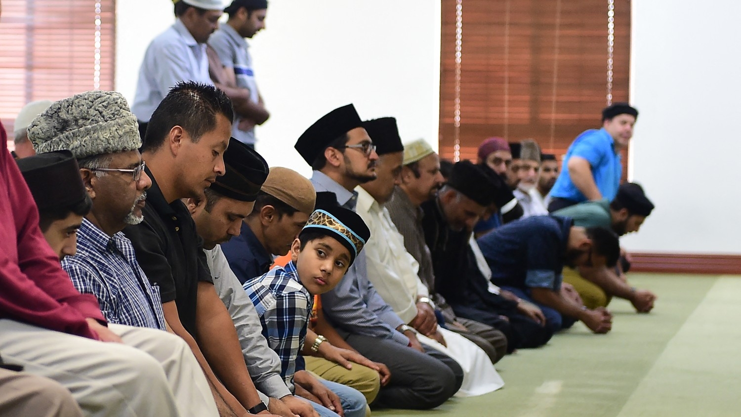 Muslims pray during closing prayers for Ramadan at the Baitul Hameed Mosque in Chino, California on 5 July 2016.