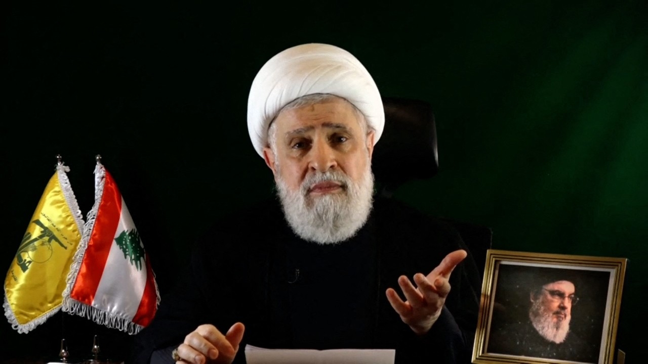 Naim Qassem delivering a speech from an undisclosed location on 15 October 2024 (AFP/Al-Manar)