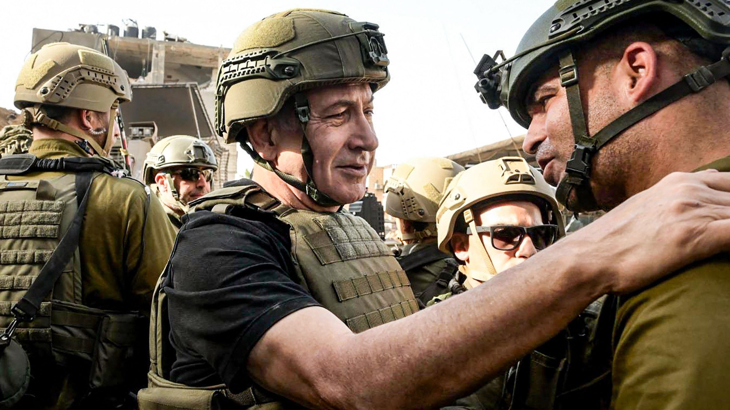 Israeli Prime Minister Benjamin Netanyahu meets soldiers at an undisclosed location in the Gaza Strip (Israeli prime minister's office/AFP)