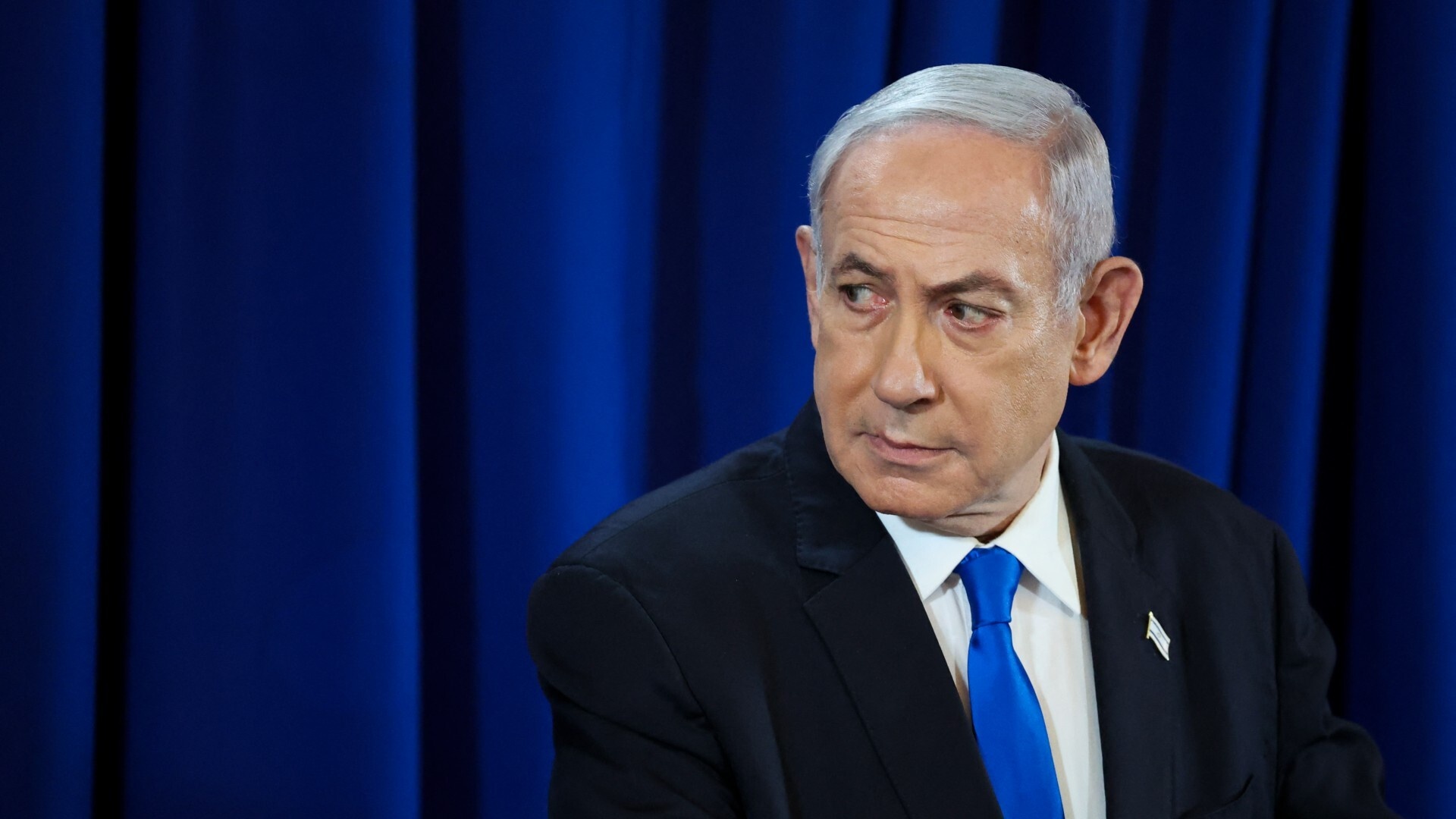 Israeli Prime Minister Benjamin Netanyahu addresses a news conference in Tel Aviv on 13 July (Nir Elias/AFP)