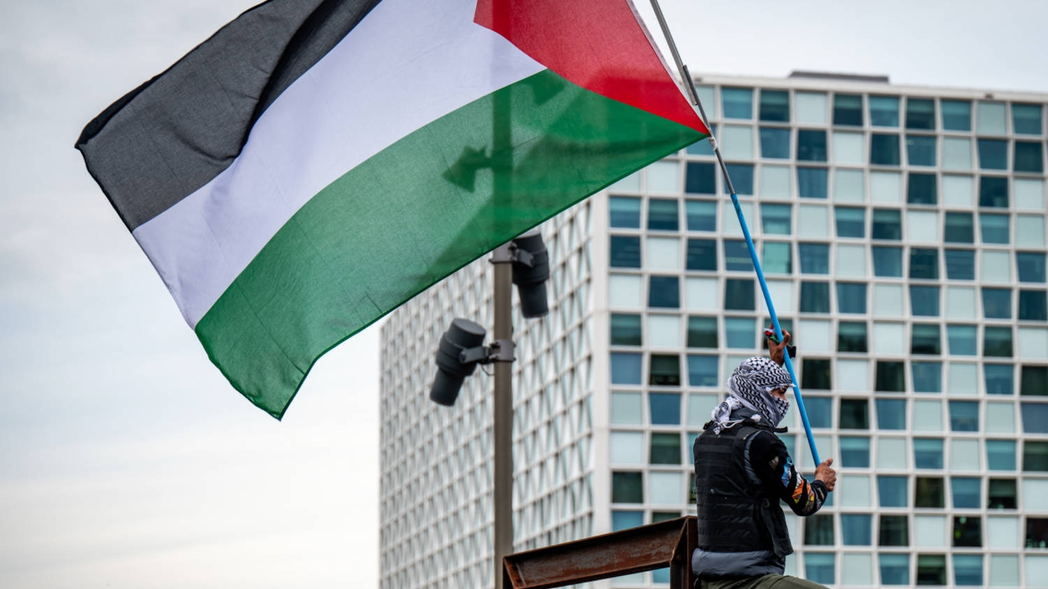 A supporter of Palestine demonstrates in front of the International Criminal Court in the Hague, Netherlands, in October 2023