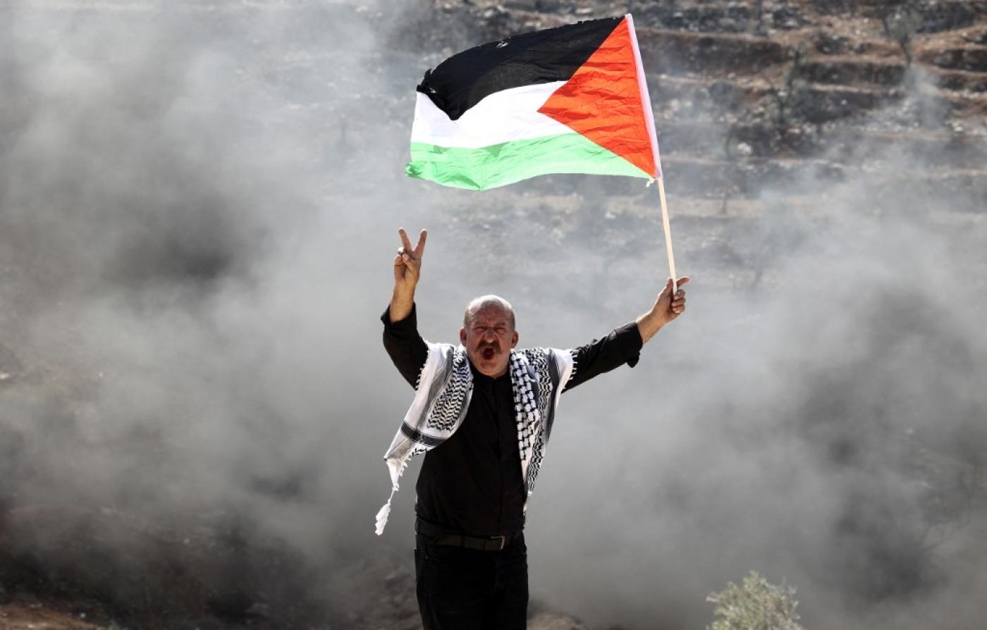 Des Palestiniens manifestent en Cisjordanie occupée le 15 octobre 2021 (AFP)