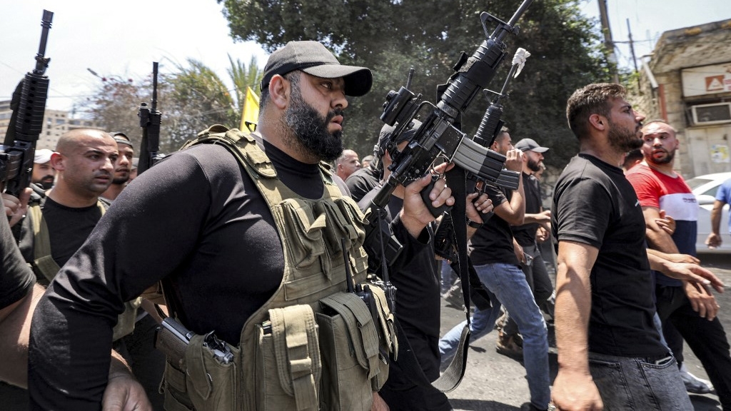 Palestinians march during the funeral of those killed during Israel’s military operation in Jenin in the occupied West Bank on 5 July 2023 (AFP)