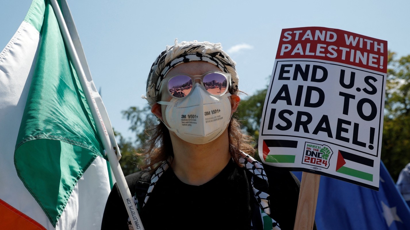 People attend a demonstration in support of Palestinians in Gaza on the sidelines of the Democratic National Convention in Chicago, Illinois on 19 August 2024.