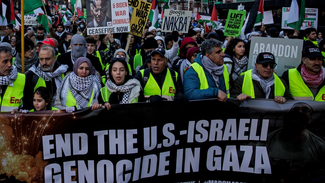  Pro-Palestine demonstrators march through the streets during a rally on 13 January 2024 in Washington DC.