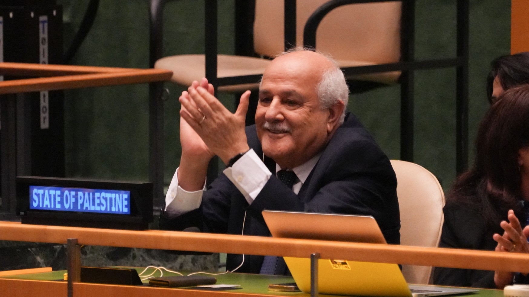 Palestinian representative Riyad Mansour applauds the result of a vote on the legal consequences of Israel's actions in the Palestinian territories at UN headquarters in New York City, on 18 September 2024 (Bryan Smith/AFP)