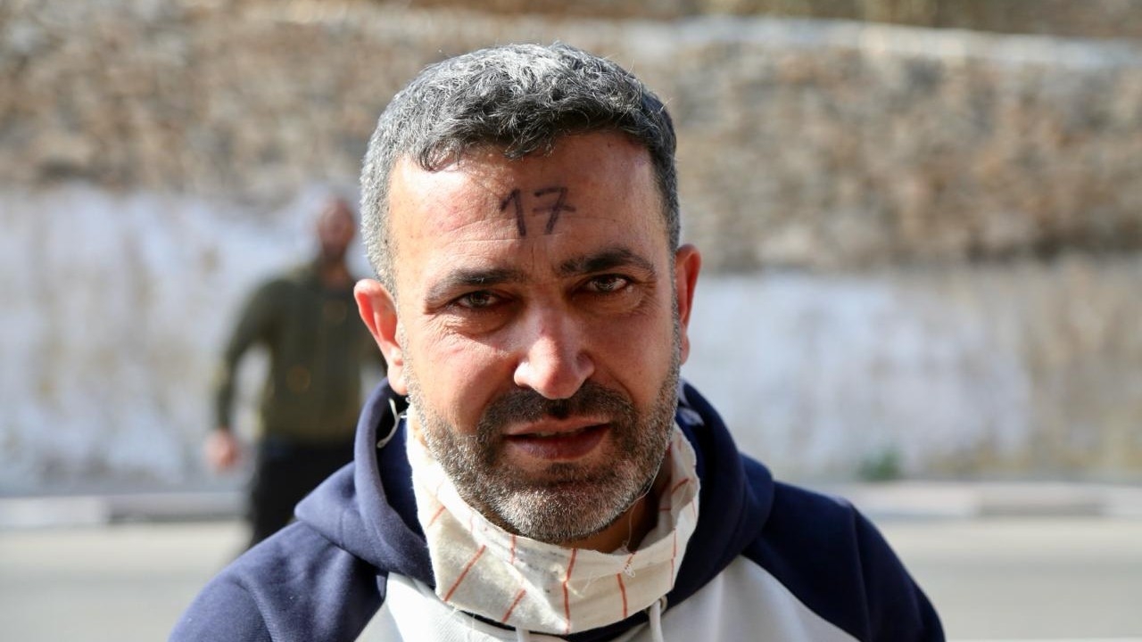 Osama Shaheen says he was beaten by soldiers as they ransacked his home and detained him (MEE/Mosab Shawer)