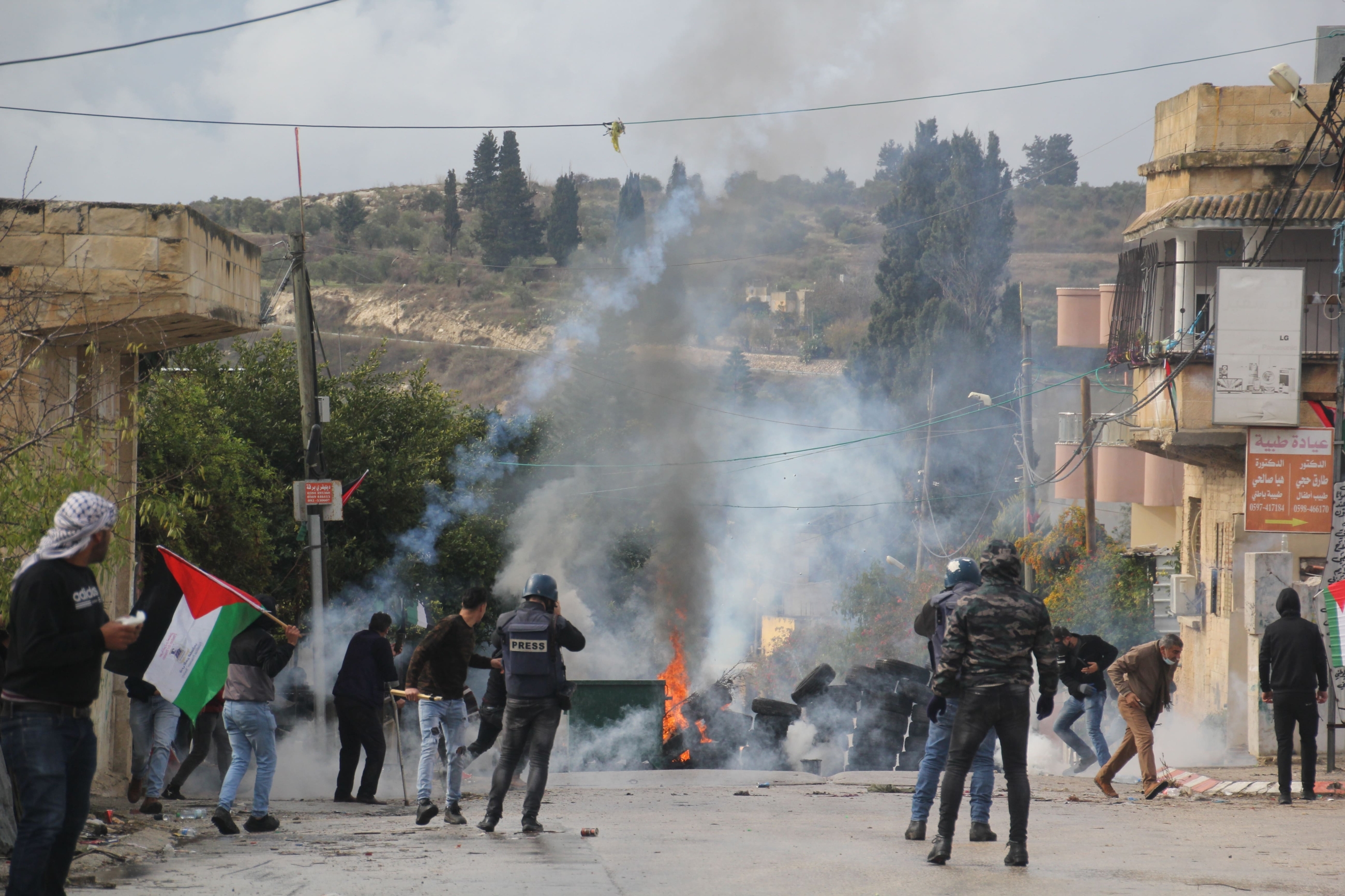 Palestinian protesters and journalists attacked by tear gas in Burqa, Nablus