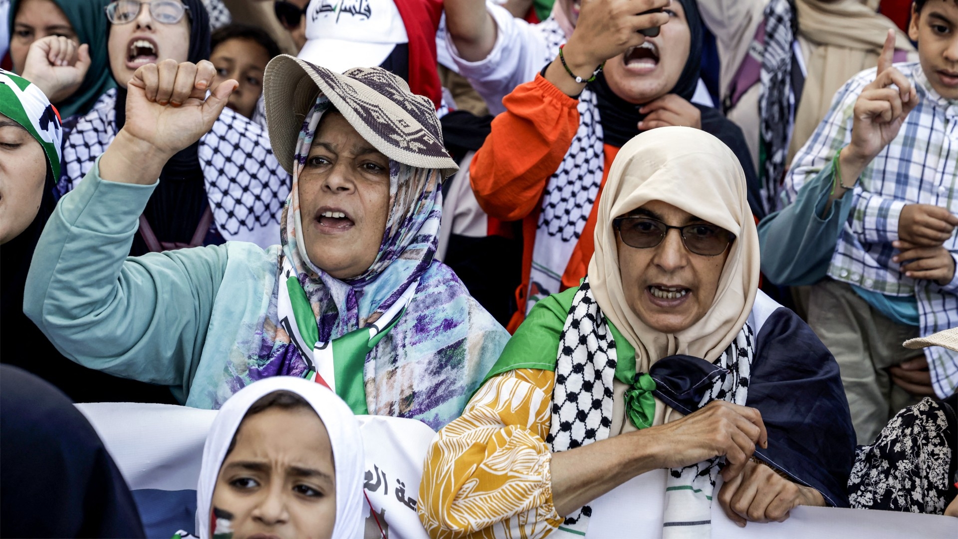 Protesters chant slogans during a mass rally in solidarity with Palestinians in Morocco's capital Rabat on 6 October 2024 (AFP)