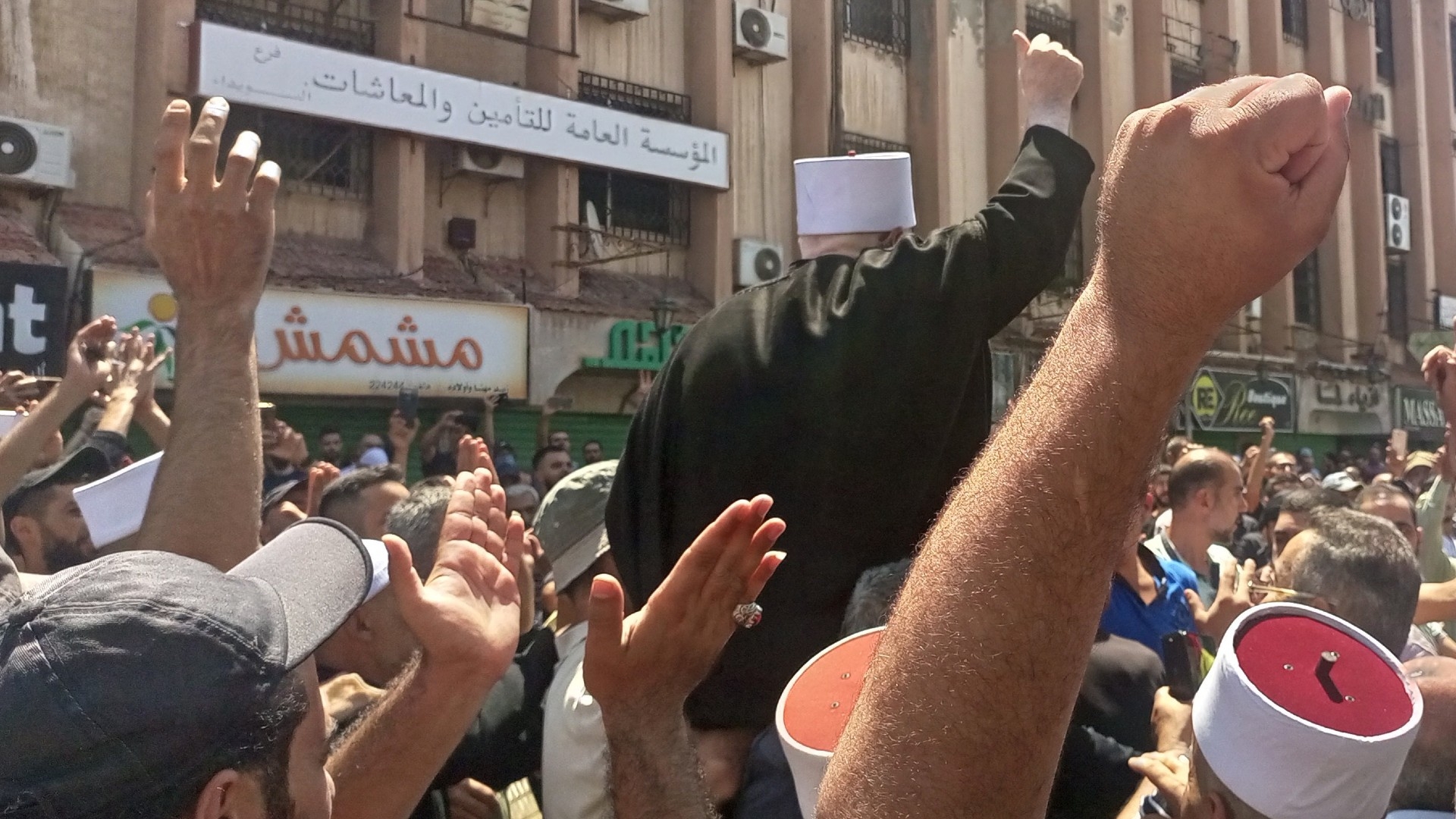 People are protesting in the southern Syrian city of Suweida on August 21, 2023, after the government raised fuel prices. 